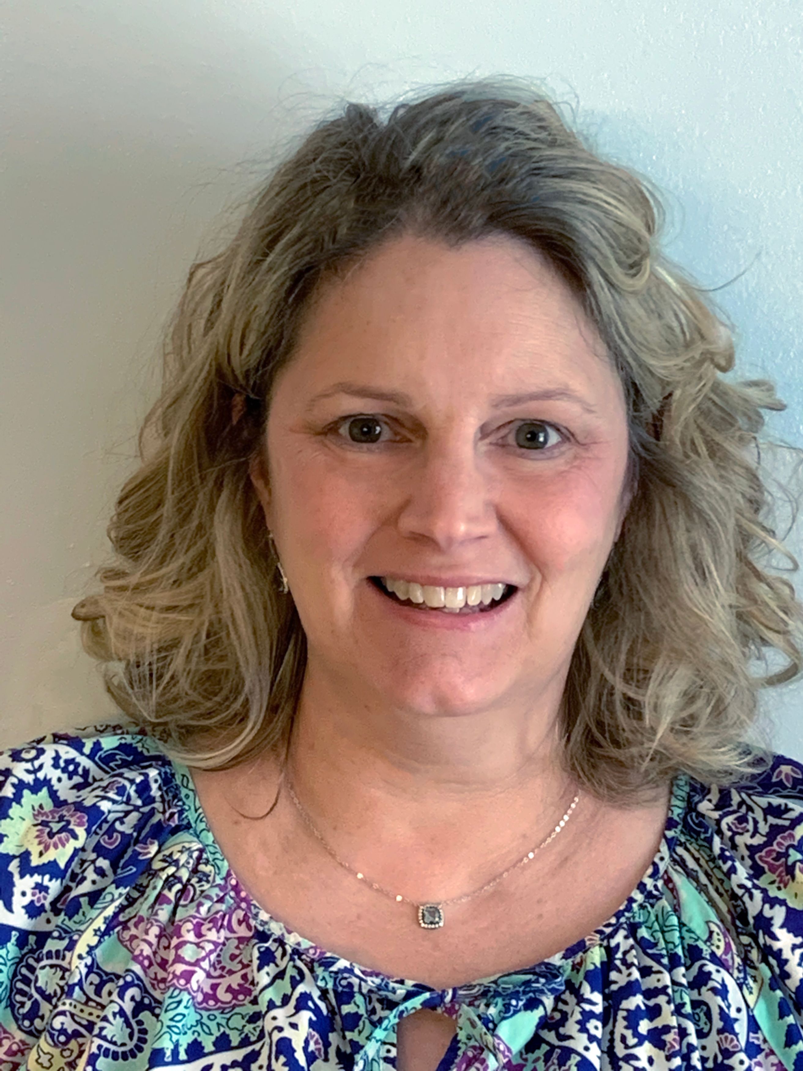 Kris Abrahamson, tennis coach